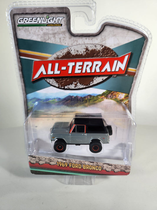 (CHASE) 1969 Ford Bronco Lifted with Soft Top - Poppy Red All-Terrain Series 16 Greenlight Collectibles